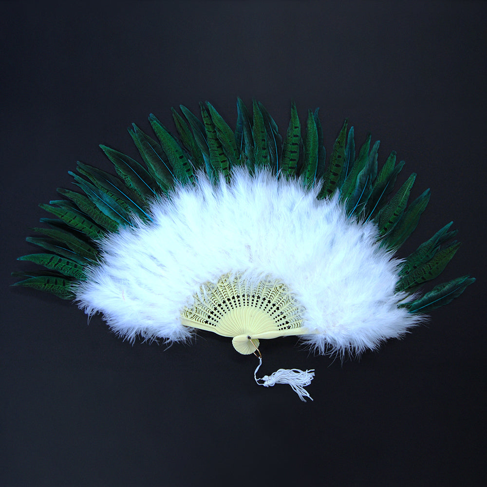 White and green fan spread out on a black background