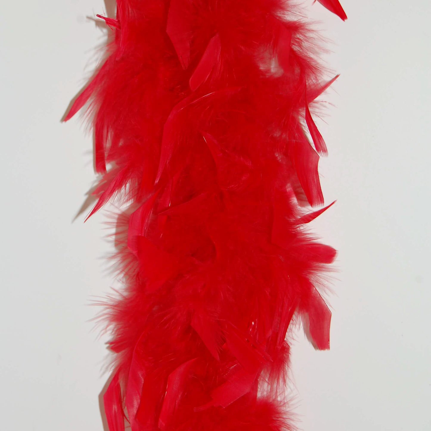 red lightweight chandelle boa on white background